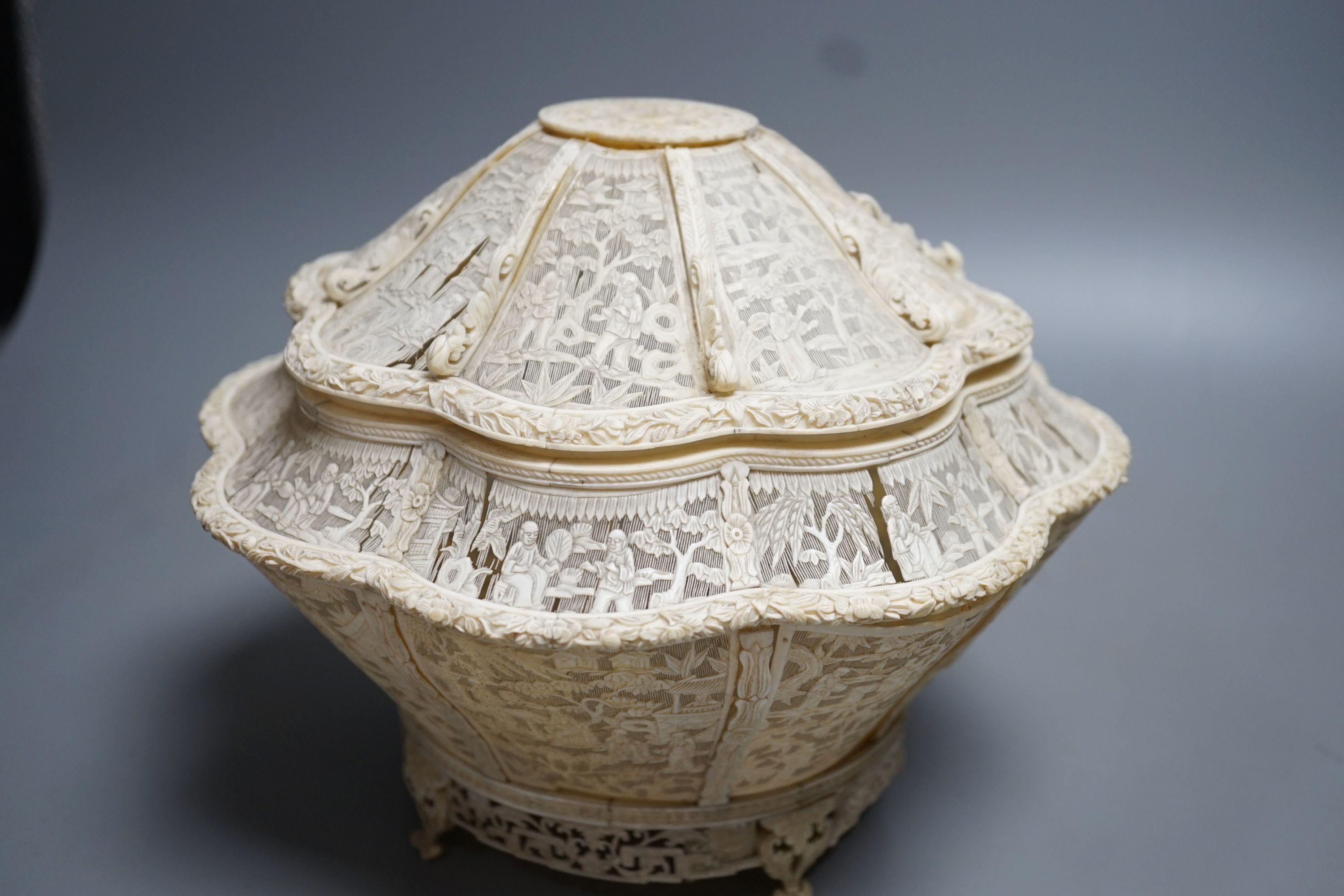 A Chinese finely pierced ivory lobed box and cover, circa 1800, 22cm